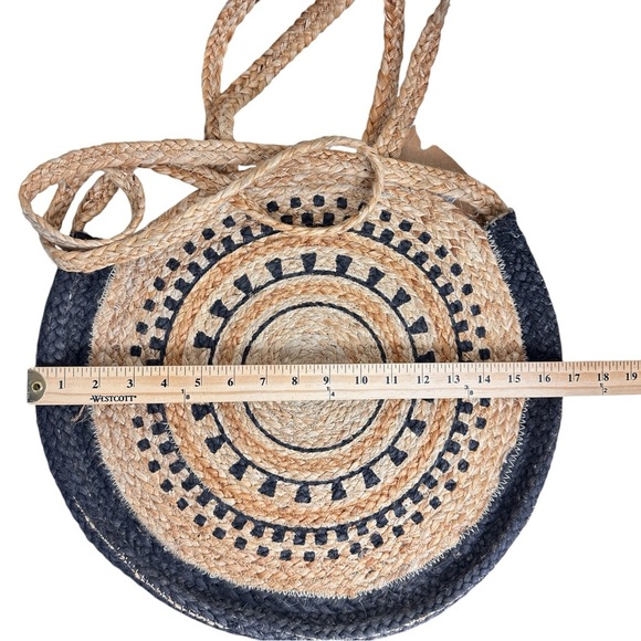 The Shanty Moroccan Round Crossbody Woven Jute Straw Beach Bag in Natural - Picture 10 of 11